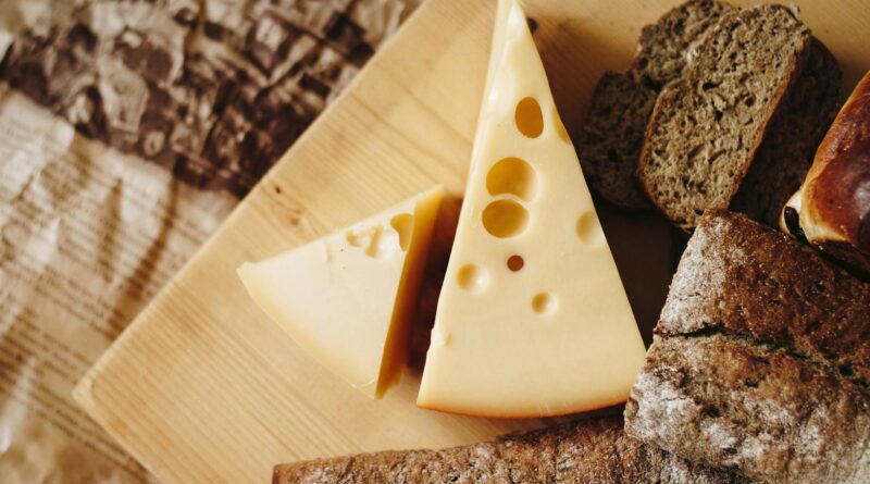 sliced cheese on brown table top